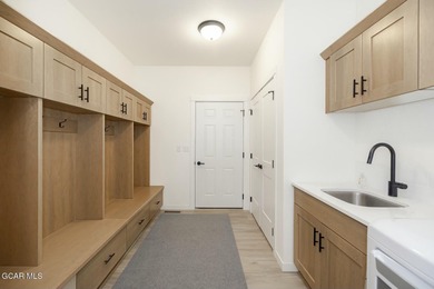 This property is engineered for exceptional STR performance on Headwaters Golf Course At Granby Ranch in Colorado - for sale on GolfHomes.com, golf home, golf lot