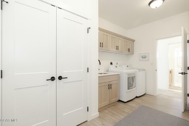 This property is engineered for exceptional STR performance on Headwaters Golf Course At Granby Ranch in Colorado - for sale on GolfHomes.com, golf home, golf lot