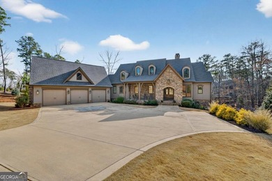 Welcome to this beautiful custom-built, 4-bedroom, 4.5-bath lake on Reynolds Lake Oconee - The Oconee in Georgia - for sale on GolfHomes.com, golf home, golf lot