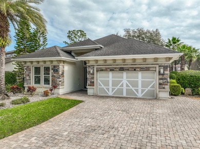 Welcome to this beautifully appointed 3-bedroom, 2-bath home on Plantation Bay Golf and Country Club in Florida - for sale on GolfHomes.com, golf home, golf lot