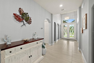Welcome to this beautifully appointed 3-bedroom, 2-bath home on Plantation Bay Golf and Country Club in Florida - for sale on GolfHomes.com, golf home, golf lot