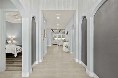 Welcome to this beautifully appointed 3-bedroom, 2-bath home on Plantation Bay Golf and Country Club in Florida - for sale on GolfHomes.com, golf home, golf lot