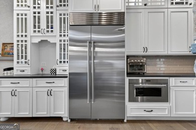 Welcome to this beautiful custom-built, 4-bedroom, 4.5-bath lake on Reynolds Lake Oconee - The Oconee in Georgia - for sale on GolfHomes.com, golf home, golf lot