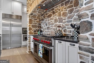 Welcome to this beautiful custom-built, 4-bedroom, 4.5-bath lake on Reynolds Lake Oconee - The Oconee in Georgia - for sale on GolfHomes.com, golf home, golf lot