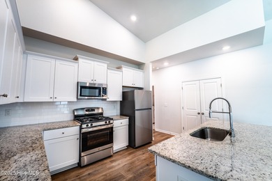 Welcome to 7956 N Balfour Drive-a beautifully maintained home on Brunswick Plantation and Golf Resorts in North Carolina - for sale on GolfHomes.com, golf home, golf lot