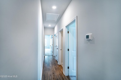 Welcome to 7956 N Balfour Drive-a beautifully maintained home on Brunswick Plantation and Golf Resorts in North Carolina - for sale on GolfHomes.com, golf home, golf lot