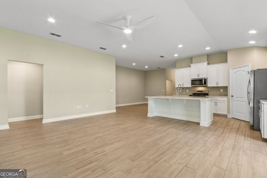 Welcome to 108 Angler Lane, a nearly new five-bedroom on The Club At Osprey Cove in Georgia - for sale on GolfHomes.com, golf home, golf lot