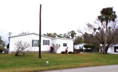 Here is a 2 bedroom, very nice (Large Corner Lot) Home with on Schalamar Creek Golf and Country Club in Florida - for sale on GolfHomes.com, golf home, golf lot