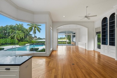 This Custom-built residence is thoughtfully designed to capture on The Loxahatchee Club in Florida - for sale on GolfHomes.com, golf home, golf lot