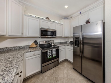 Waterview villa in Gran Paradiso offering resort amenities and on Plantation Golf and Country Club in Florida - for sale on GolfHomes.com, golf home, golf lot