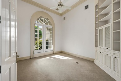 This Custom-built residence is thoughtfully designed to capture on The Loxahatchee Club in Florida - for sale on GolfHomes.com, golf home, golf lot