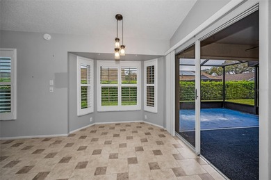 IN TIMBER GREENS A 55+ GATED GOLF COMMUNITY.....This 2-bedroom on Timber Greens Country Club in Florida - for sale on GolfHomes.com, golf home, golf lot