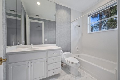 This Custom-built residence is thoughtfully designed to capture on The Loxahatchee Club in Florida - for sale on GolfHomes.com, golf home, golf lot