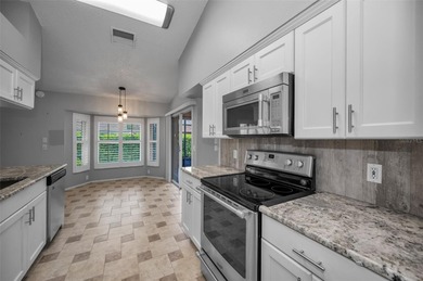 IN TIMBER GREENS A 55+ GATED GOLF COMMUNITY.....This 2-bedroom on Timber Greens Country Club in Florida - for sale on GolfHomes.com, golf home, golf lot