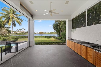 This Custom-built residence is thoughtfully designed to capture on The Loxahatchee Club in Florida - for sale on GolfHomes.com, golf home, golf lot