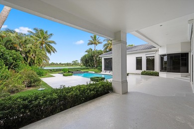 This Custom-built residence is thoughtfully designed to capture on The Loxahatchee Club in Florida - for sale on GolfHomes.com, golf home, golf lot