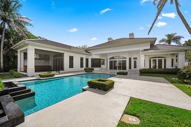 This Custom-built residence is thoughtfully designed to capture on The Loxahatchee Club in Florida - for sale on GolfHomes.com, golf home, golf lot