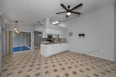 IN TIMBER GREENS A 55+ GATED GOLF COMMUNITY.....This 2-bedroom on Timber Greens Country Club in Florida - for sale on GolfHomes.com, golf home, golf lot