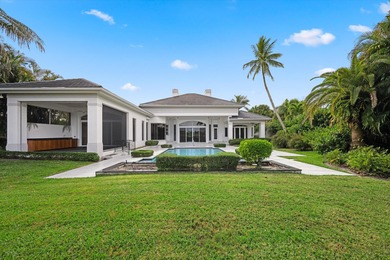This Custom-built residence is thoughtfully designed to capture on The Loxahatchee Club in Florida - for sale on GolfHomes.com, golf home, golf lot
