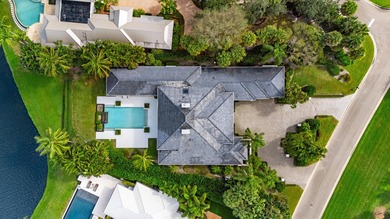 This Custom-built residence is thoughtfully designed to capture on The Loxahatchee Club in Florida - for sale on GolfHomes.com, golf home, golf lot