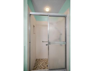 IN TIMBER GREENS A 55+ GATED GOLF COMMUNITY.....This 2-bedroom on Timber Greens Country Club in Florida - for sale on GolfHomes.com, golf home, golf lot