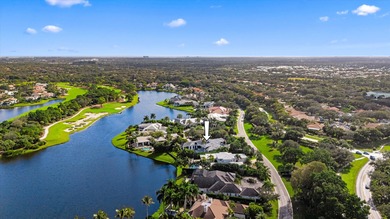 This Custom-built residence is thoughtfully designed to capture on The Loxahatchee Club in Florida - for sale on GolfHomes.com, golf home, golf lot