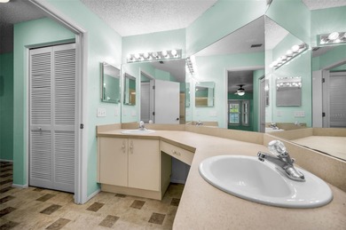 IN TIMBER GREENS A 55+ GATED GOLF COMMUNITY.....This 2-bedroom on Timber Greens Country Club in Florida - for sale on GolfHomes.com, golf home, golf lot