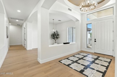 Modern Mountain Living Reimagined.  Discover elevated luxury in on Estrella Mountain Ranch Golf Course in Arizona - for sale on GolfHomes.com, golf home, golf lot