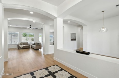 Modern Mountain Living Reimagined.  Discover elevated luxury in on Estrella Mountain Ranch Golf Course in Arizona - for sale on GolfHomes.com, golf home, golf lot