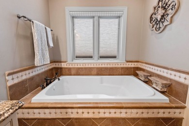 Meticulously maintained home offers exceptional amenities and on Thornberry Creek At Oneida in Wisconsin - for sale on GolfHomes.com, golf home, golf lot