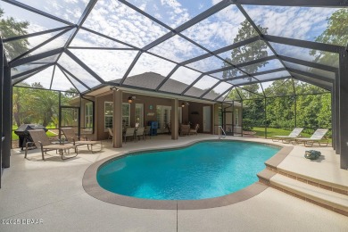 Halifax Plantation pool home. Immaculately maintained. Built by on Halifax Plantation Golf Club in Florida - for sale on GolfHomes.com, golf home, golf lot