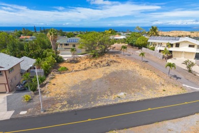 It's time to build your new home.  This gently sloped lot has on Waikoloa Village Golf Club in Hawaii - for sale on GolfHomes.com, golf home, golf lot