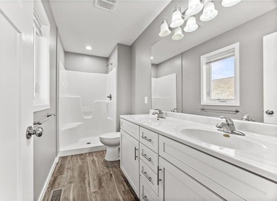 Special features that stand out include 3 bedrooms on the same on Wild Marsh Golf Club in Minnesota - for sale on GolfHomes.com, golf home, golf lot