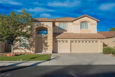 Experience refined living in this elegant 4-bedroom, 3-bath on Rhodes Ranch Golf Club in Nevada - for sale on GolfHomes.com, golf home, golf lot