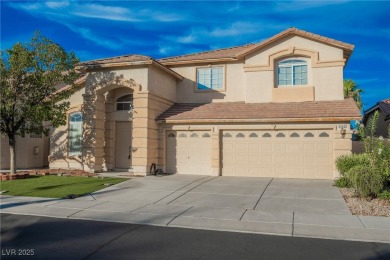 Experience refined living in this elegant 4-bedroom, 3-bath on Rhodes Ranch Golf Club in Nevada - for sale on GolfHomes.com, golf home, golf lot