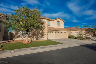 Experience refined living in this elegant 4-bedroom, 3-bath on Rhodes Ranch Golf Club in Nevada - for sale on GolfHomes.com, golf home, golf lot