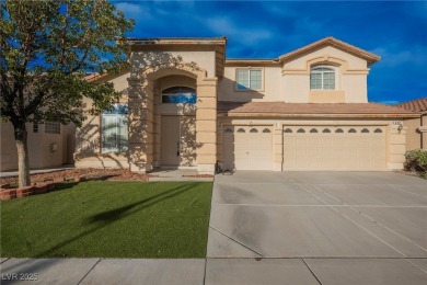 Experience refined living in this elegant 4-bedroom, 3-bath on Rhodes Ranch Golf Club in Nevada - for sale on GolfHomes.com, golf home, golf lot