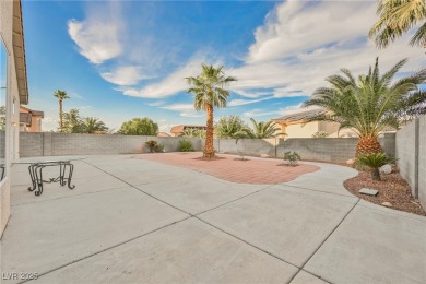 Experience refined living in this elegant 4-bedroom, 3-bath on Rhodes Ranch Golf Club in Nevada - for sale on GolfHomes.com, golf home, golf lot
