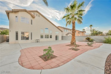 Experience refined living in this elegant 4-bedroom, 3-bath on Rhodes Ranch Golf Club in Nevada - for sale on GolfHomes.com, golf home, golf lot