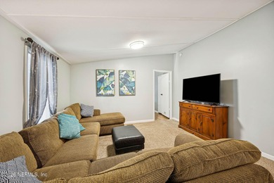 This is the perfect opportunity to live just across a peaceful on  in Florida - for sale on GolfHomes.com, golf home, golf lot