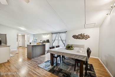 This is the perfect opportunity to live just across a peaceful on  in Florida - for sale on GolfHomes.com, golf home, golf lot