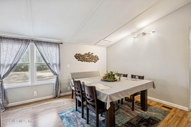 This is the perfect opportunity to live just across a peaceful on  in Florida - for sale on GolfHomes.com, golf home, golf lot