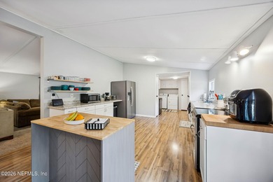 This is the perfect opportunity to live just across a peaceful on  in Florida - for sale on GolfHomes.com, golf home, golf lot