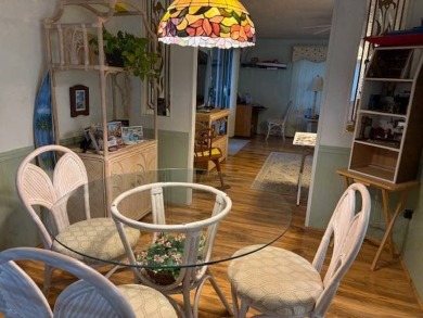 This home is in a 55 plus community with a monthly lot rent of on Crystal Lake Club in Florida - for sale on GolfHomes.com, golf home, golf lot