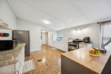 This is the perfect opportunity to live just across a peaceful on  in Florida - for sale on GolfHomes.com, golf home, golf lot