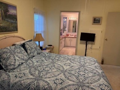 This home is in a 55 plus community with a monthly lot rent of on Crystal Lake Club in Florida - for sale on GolfHomes.com, golf home, golf lot