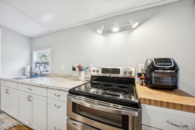 This is the perfect opportunity to live just across a peaceful on  in Florida - for sale on GolfHomes.com, golf home, golf lot