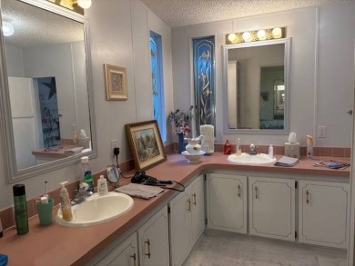 This home is in a 55 plus community with a monthly lot rent of on Crystal Lake Club in Florida - for sale on GolfHomes.com, golf home, golf lot