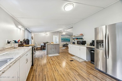 This is the perfect opportunity to live just across a peaceful on  in Florida - for sale on GolfHomes.com, golf home, golf lot