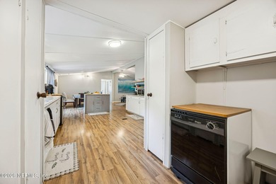 This is the perfect opportunity to live just across a peaceful on  in Florida - for sale on GolfHomes.com, golf home, golf lot